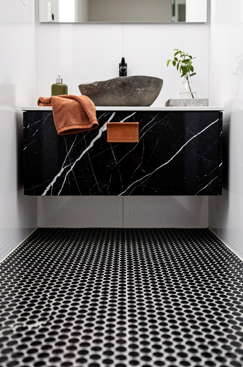 Mix penny tile floors with glossy white walls