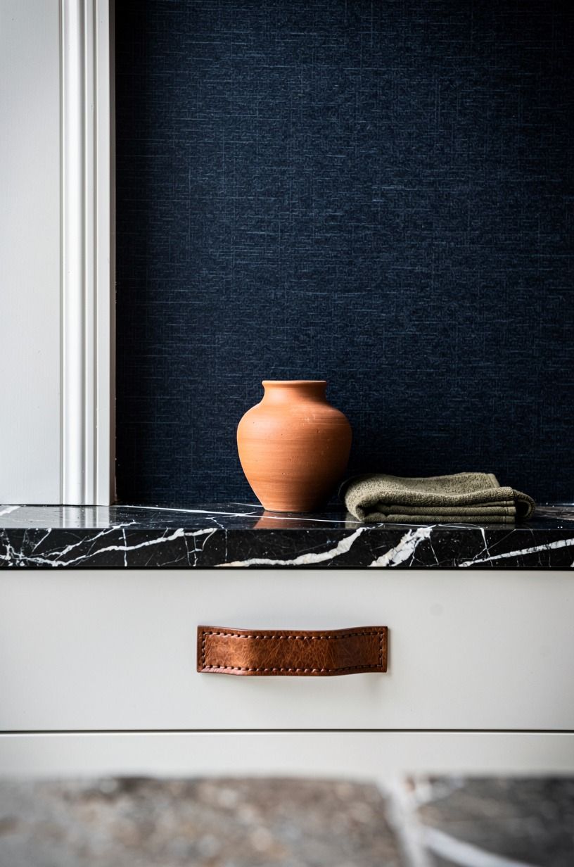 Choose navy grasscloth above white trim