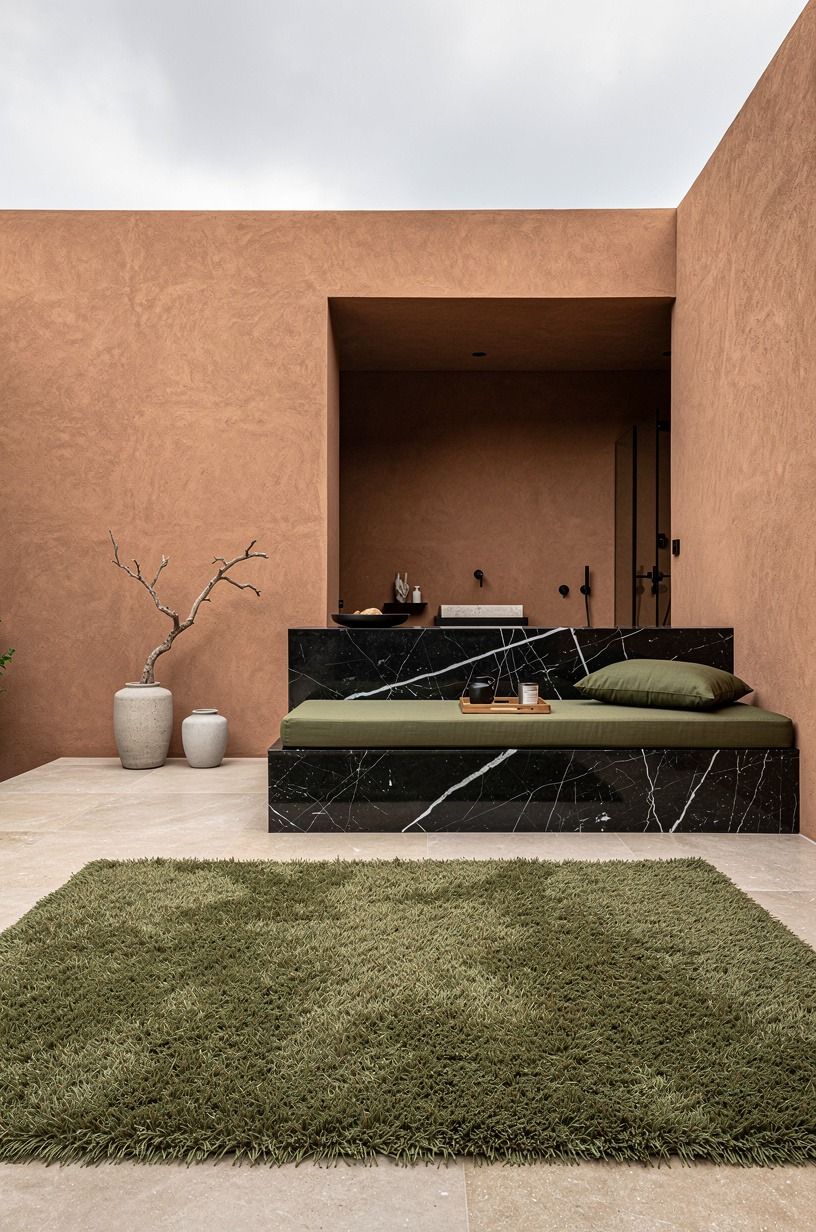 Anchor the seating with an outdoor rug that can drink