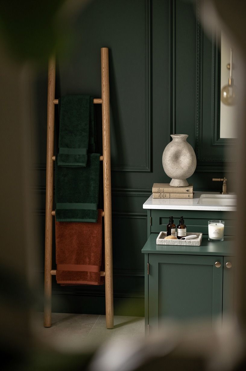 Build a towel ladder instead of adding a cabinet