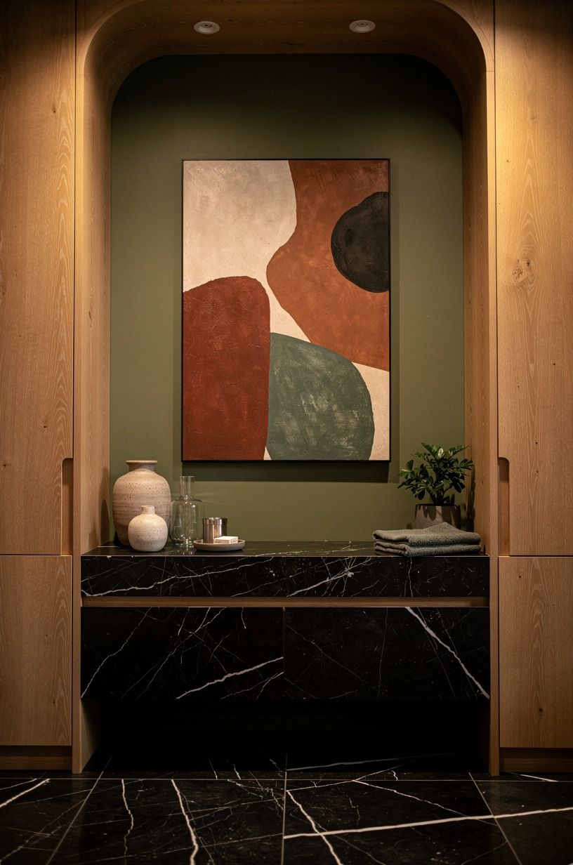 Hang art where a towel rack would usually go