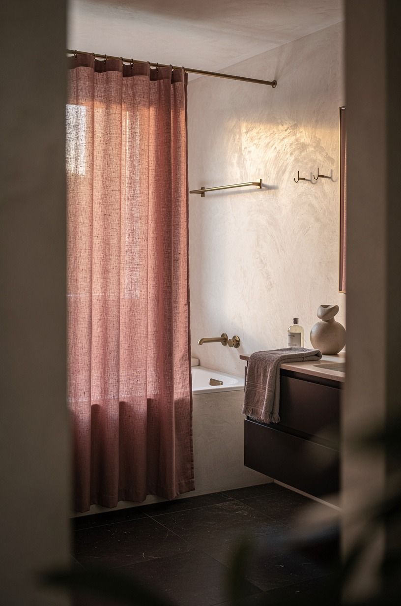 Hang linen curtains instead of leaning on the plastic liner