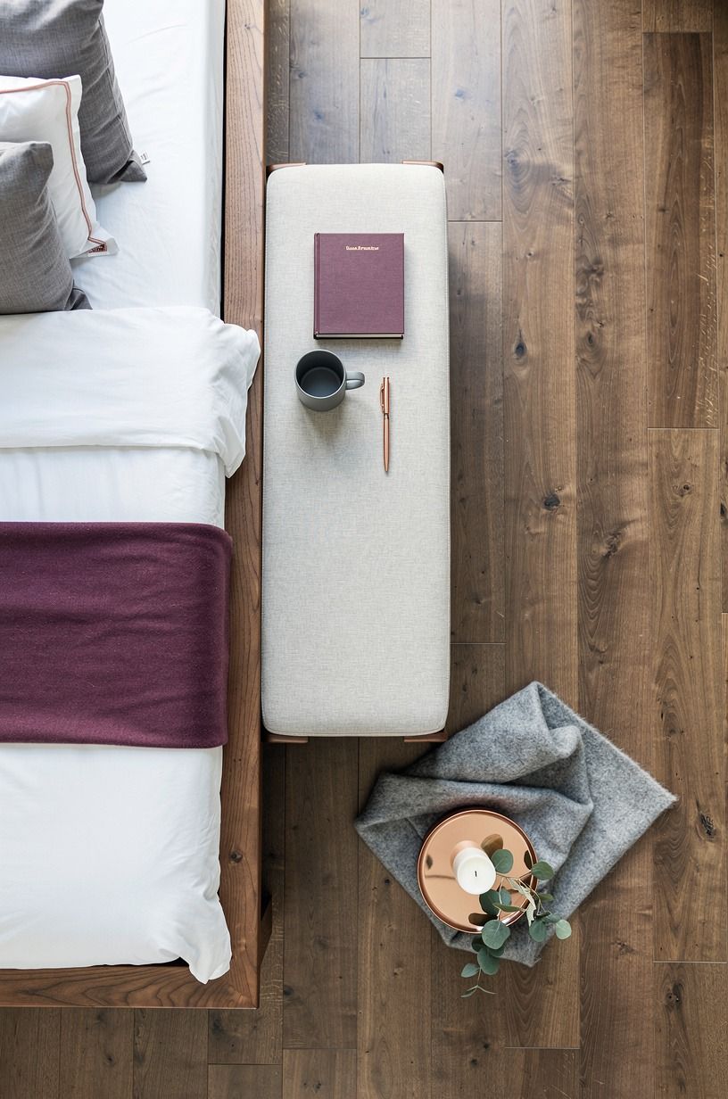 Slide a slim bench at the bed foot