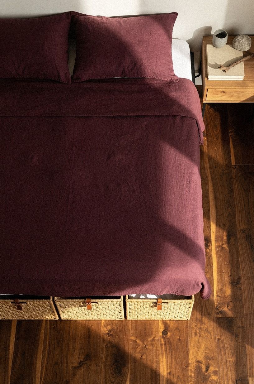 Float a slim shelf strip just above the headboard