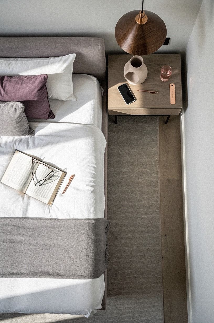 Layer a slim runner rug across the width