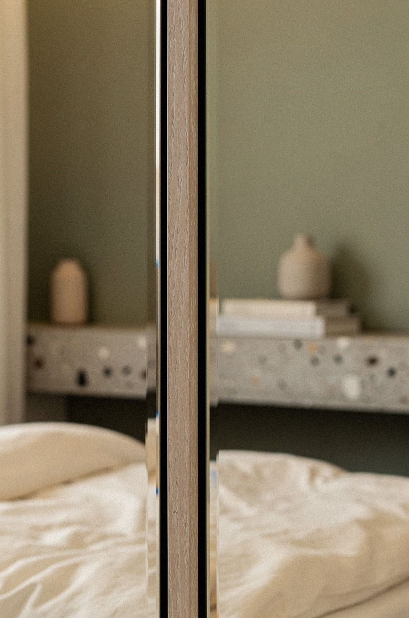 Install mirror slabs that read as wall panels