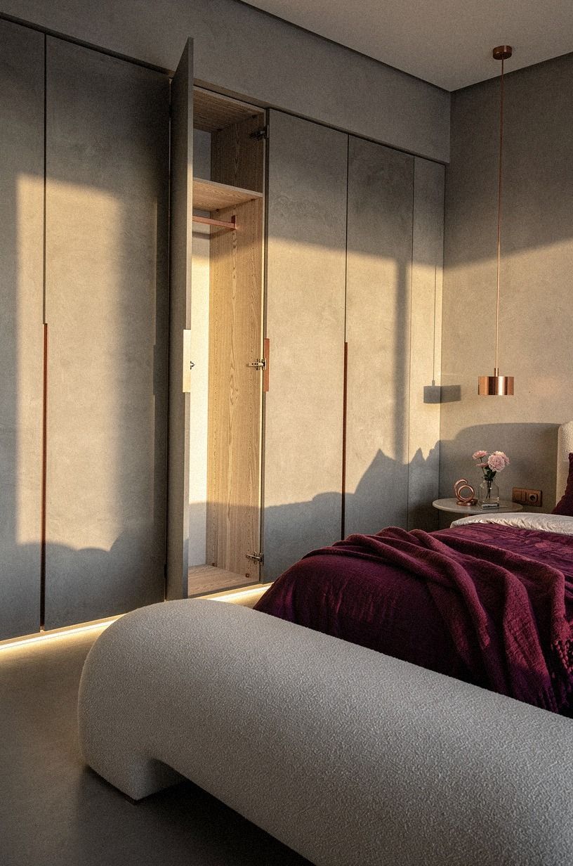 Light the toe-kick below invisible wardrobe fronts