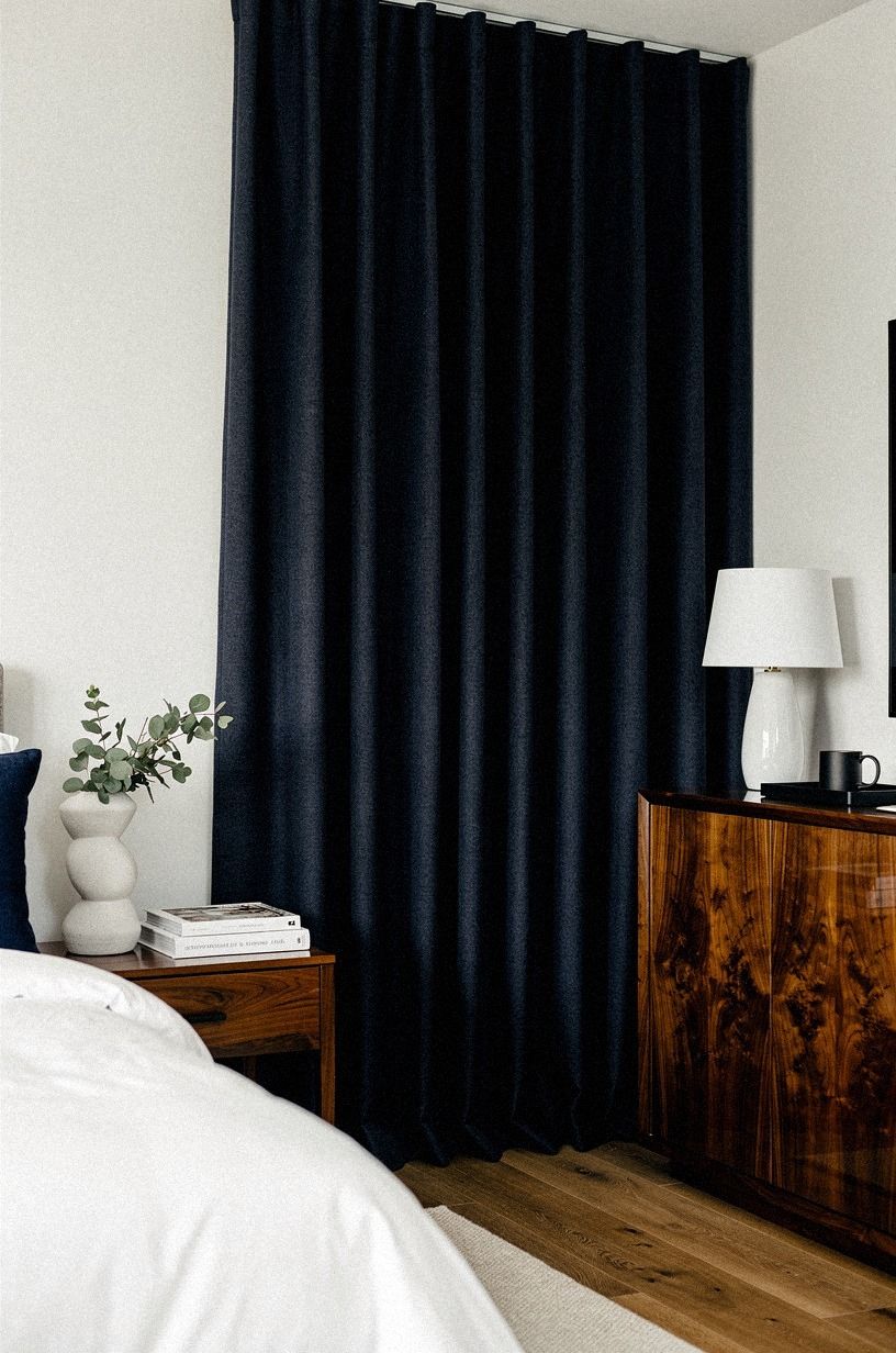 Hide the closet door with a curtain instead of bi-folds