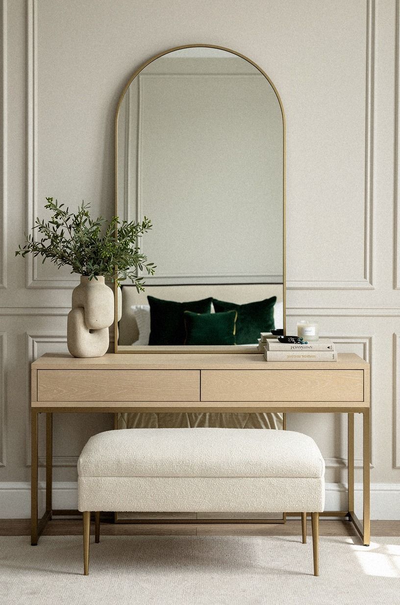 Replace the builder-grade mirror with an arched floor mirror