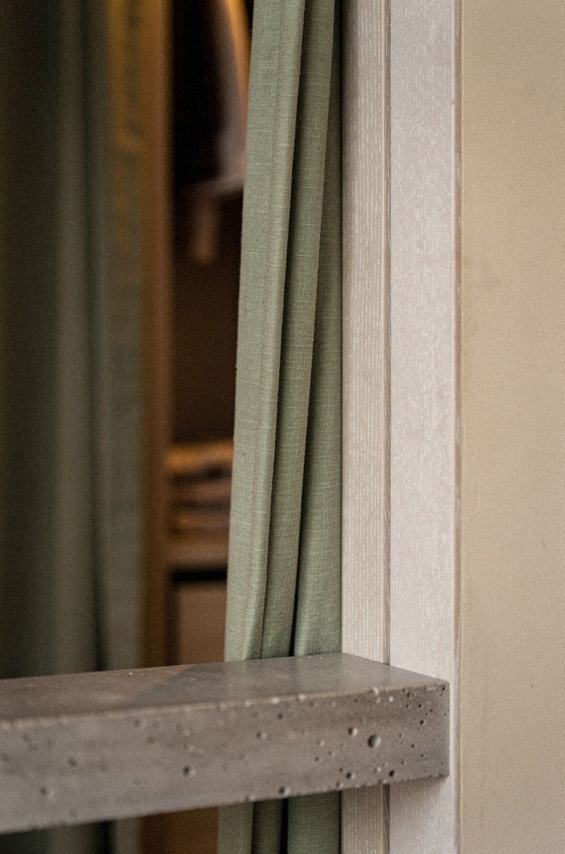 Blend bifold doors behind curtain panels