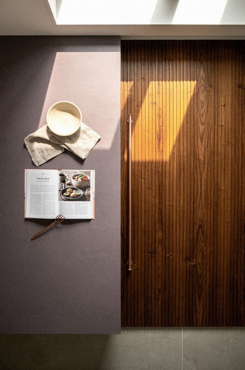 Layer reeded panels across the hidden pantry door
