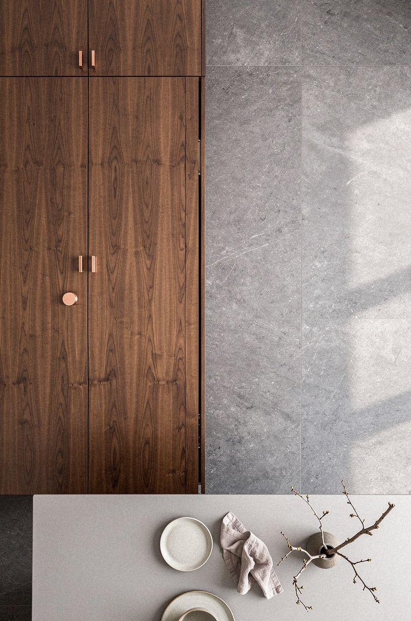 Disguise the entrance as a tall appliance wall