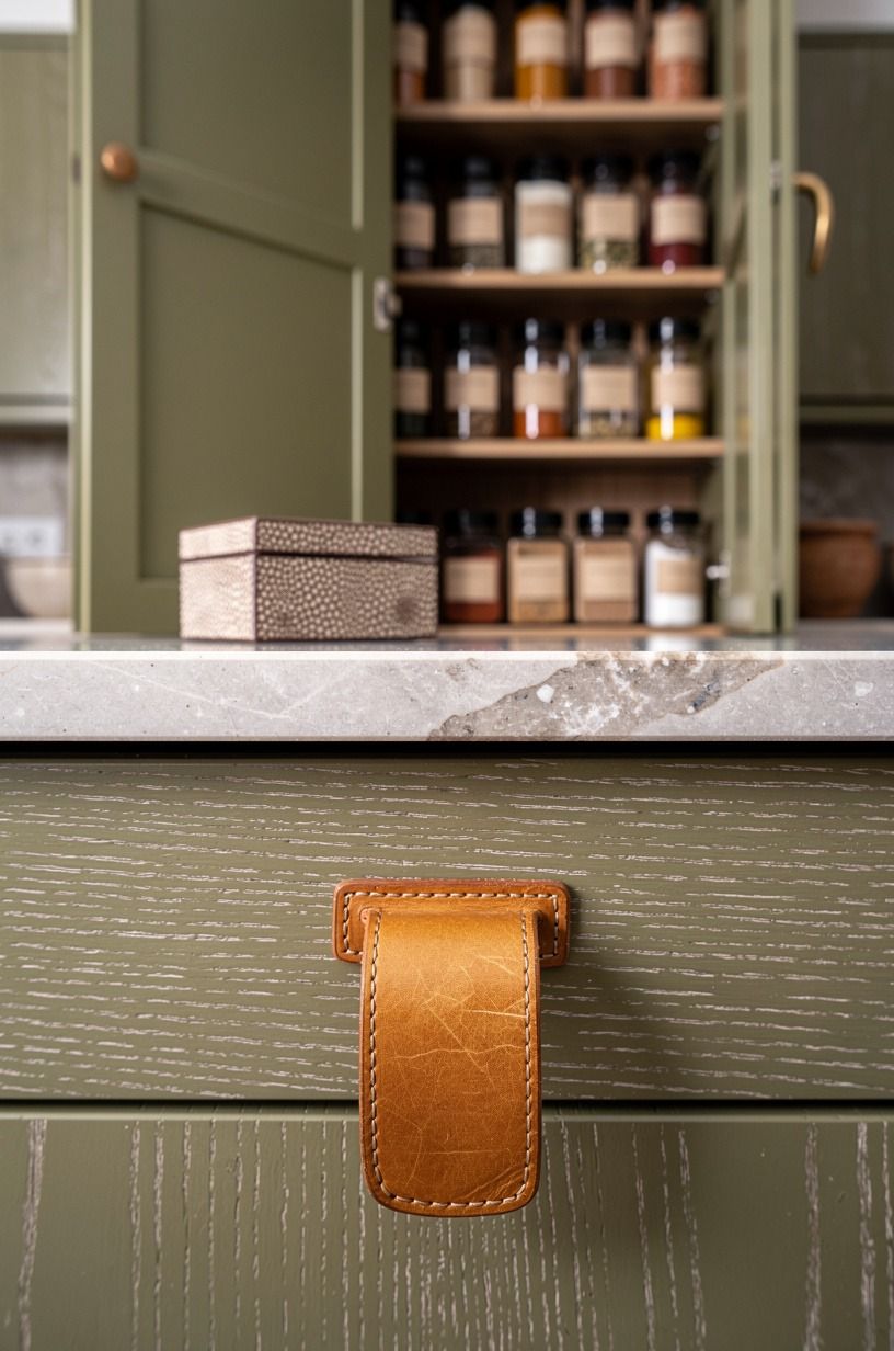 Hang shallow spice racks behind the disguise