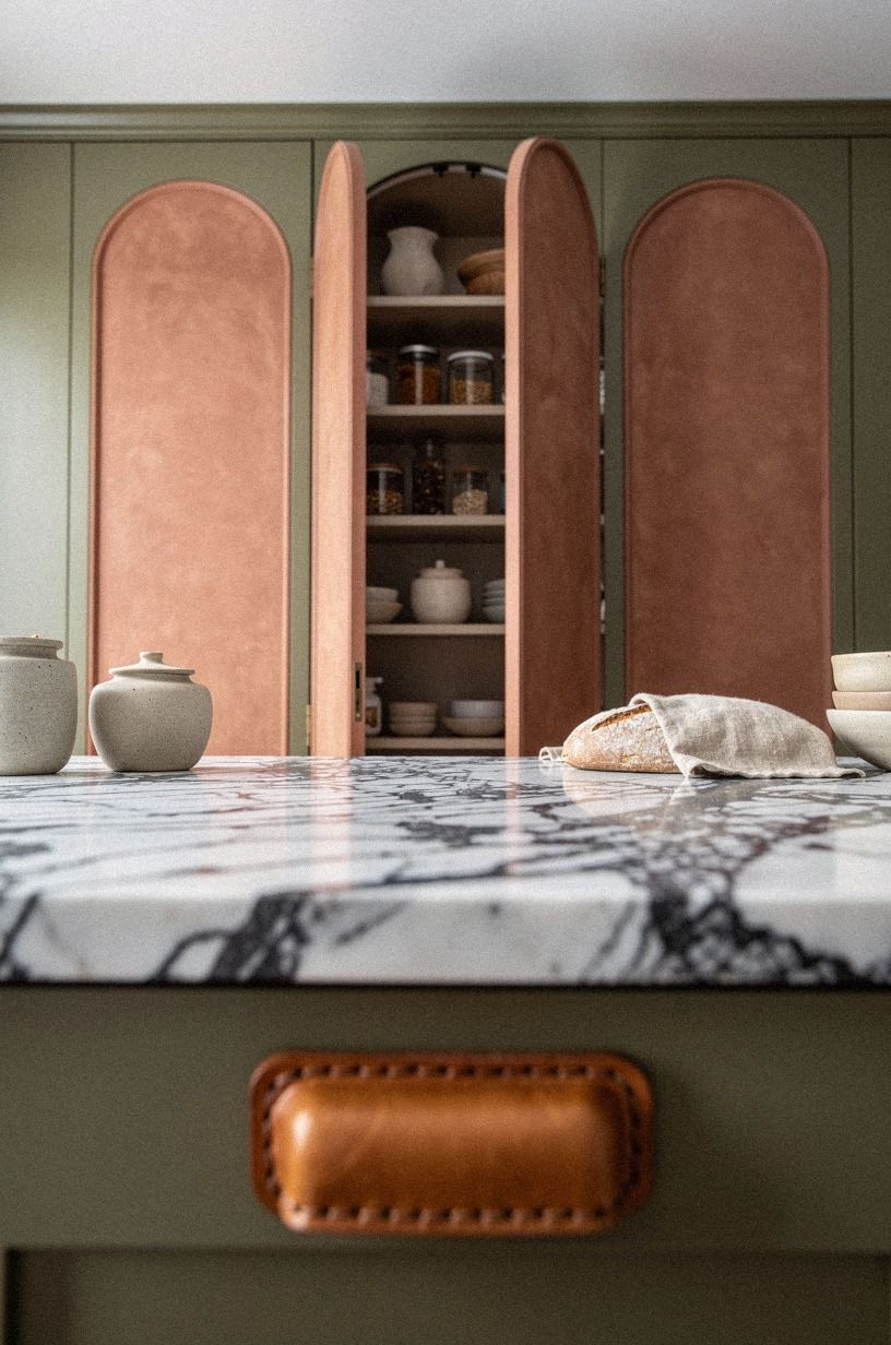 Mask a storage room with arched millwork