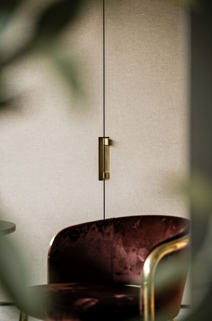 Install push-latch hardware for a handleless look