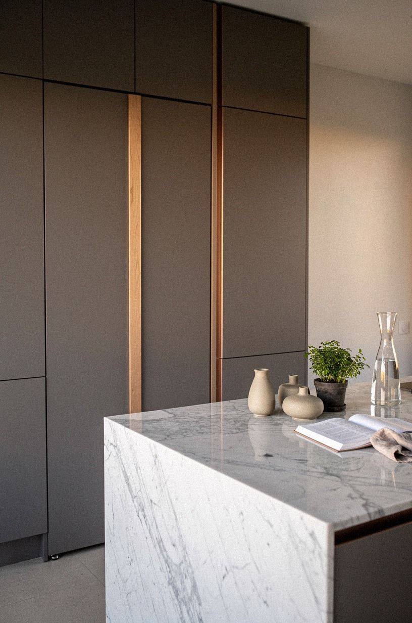 Blend the door with floor to ceiling millwork
