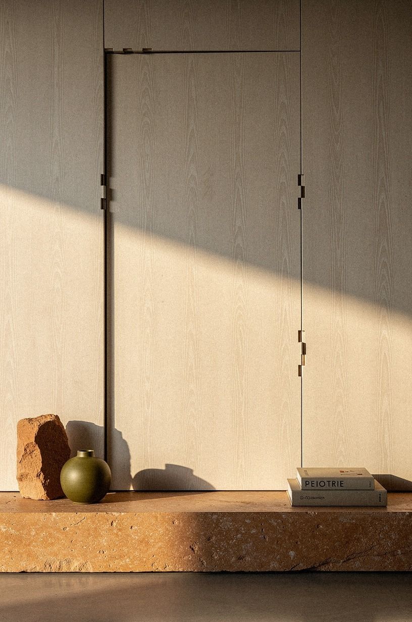 Align wall paneling across the door reveal