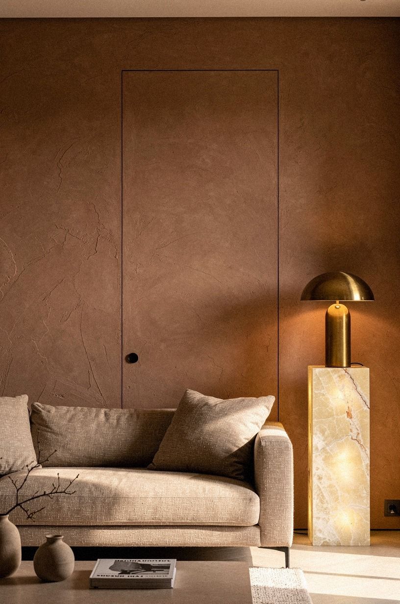 Paint the slab in the exact wall color