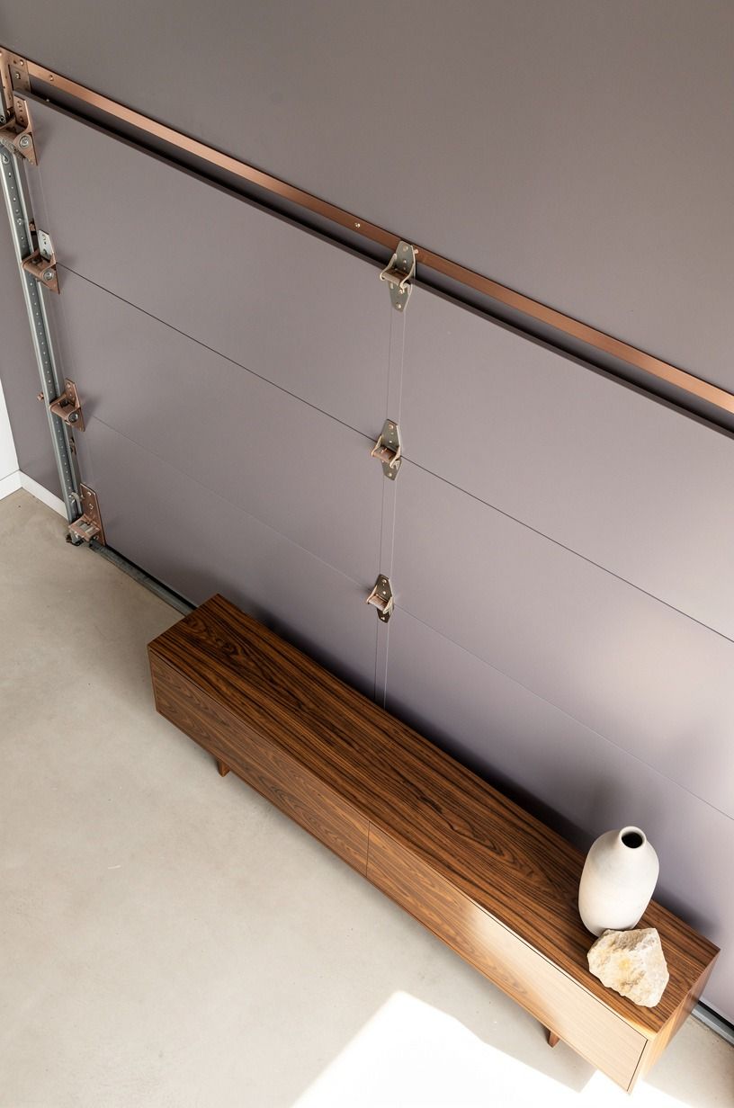 Paint the door flush with the living room wall