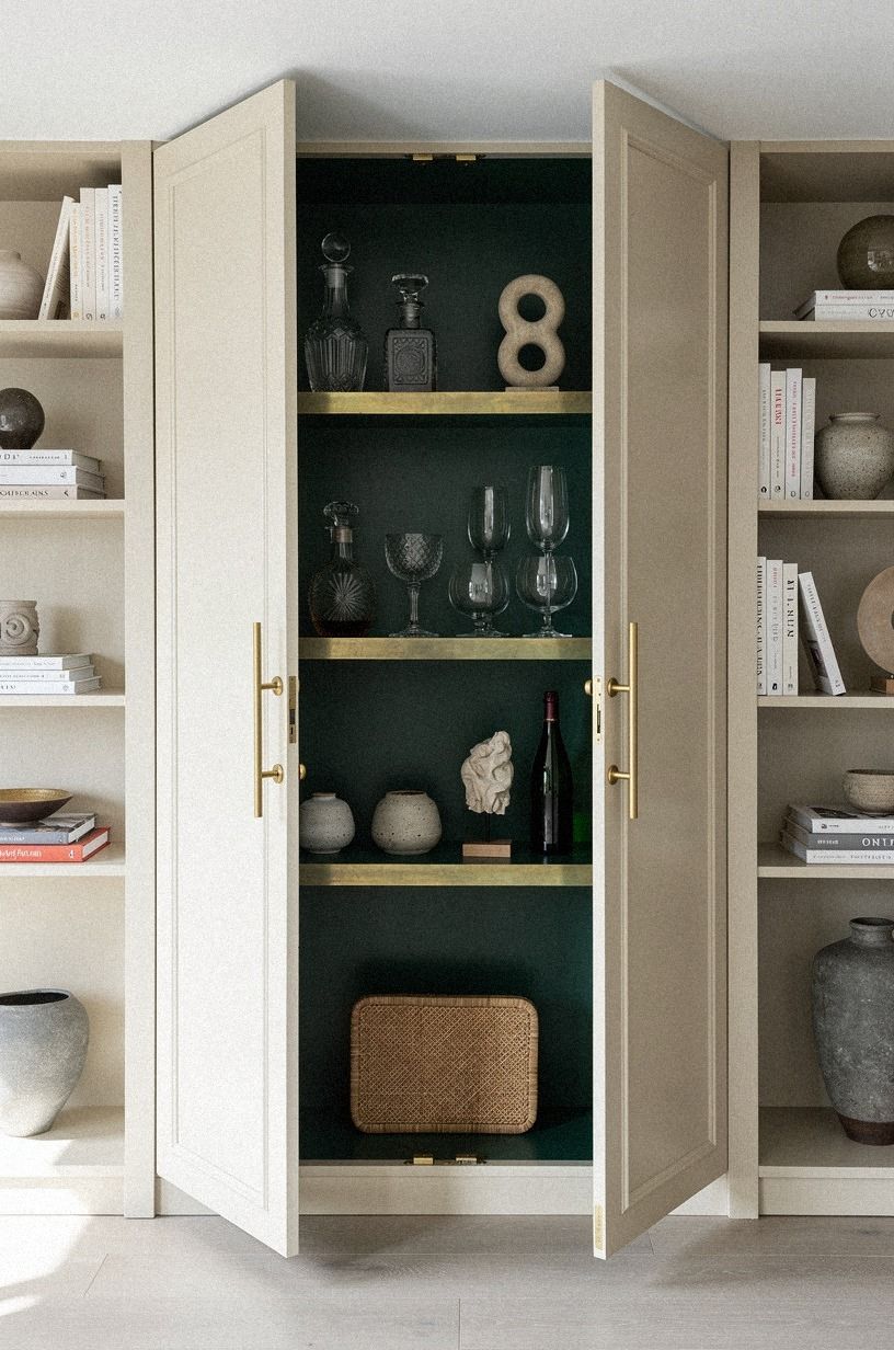 Tuck a bar cabinet inside the bookcase