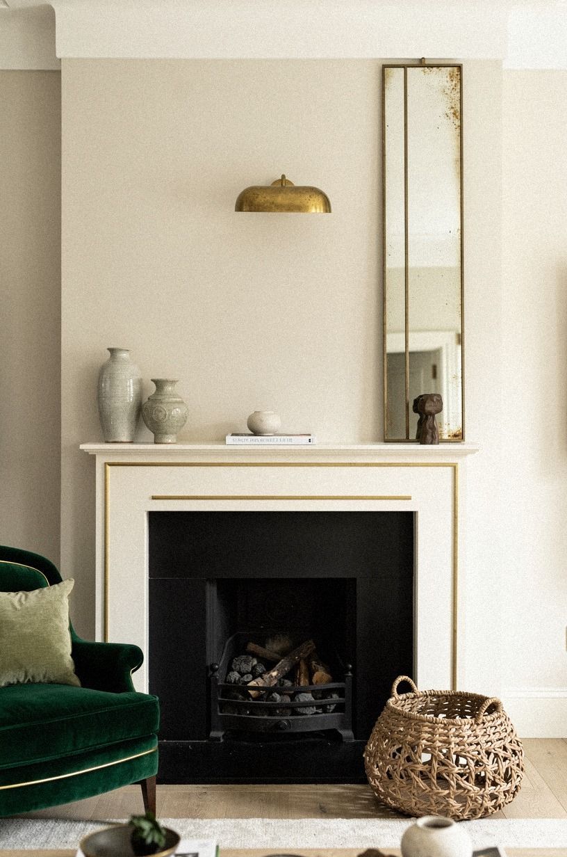 Could a mirrored slab beside the mantel feel subtle?