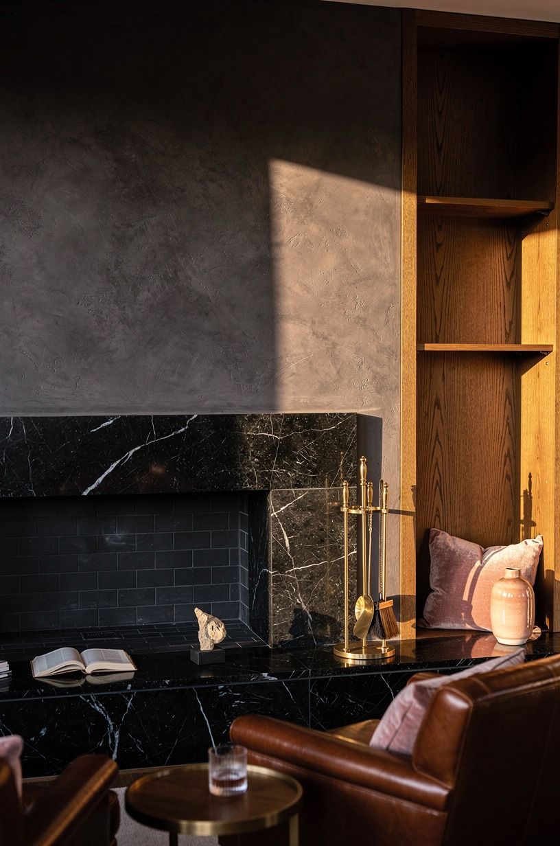 Tile the hearth in aged black marble