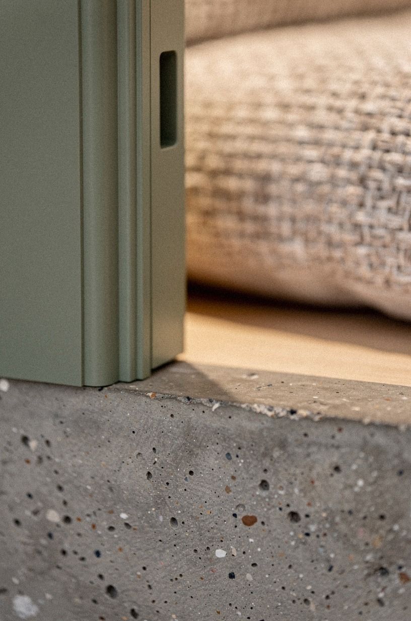 Conceal the handle inside sculptural trim