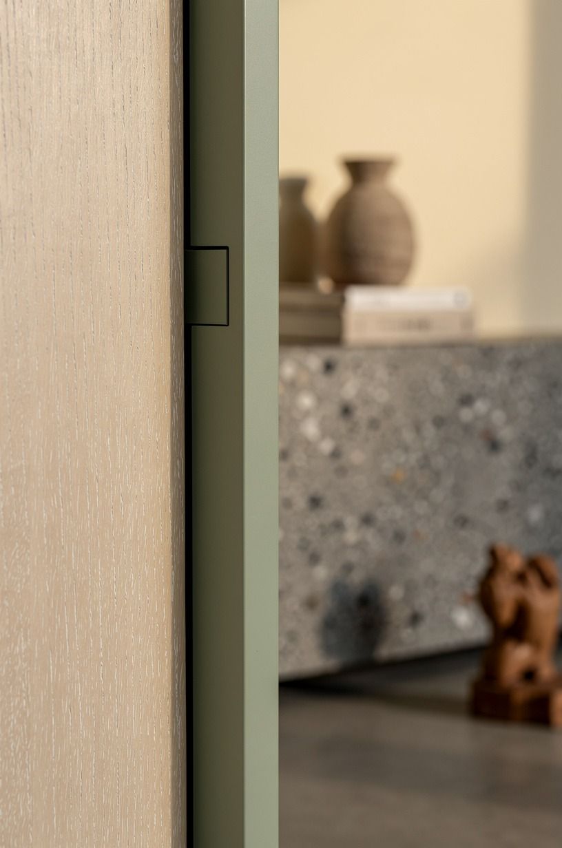 Run picture-frame molding across the door face