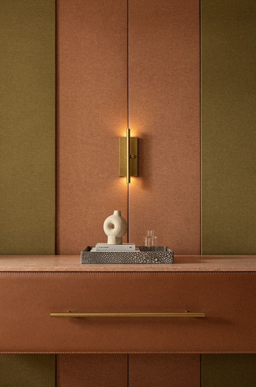 Hide the pull inside an aged brass picture light for a touch of sparkle