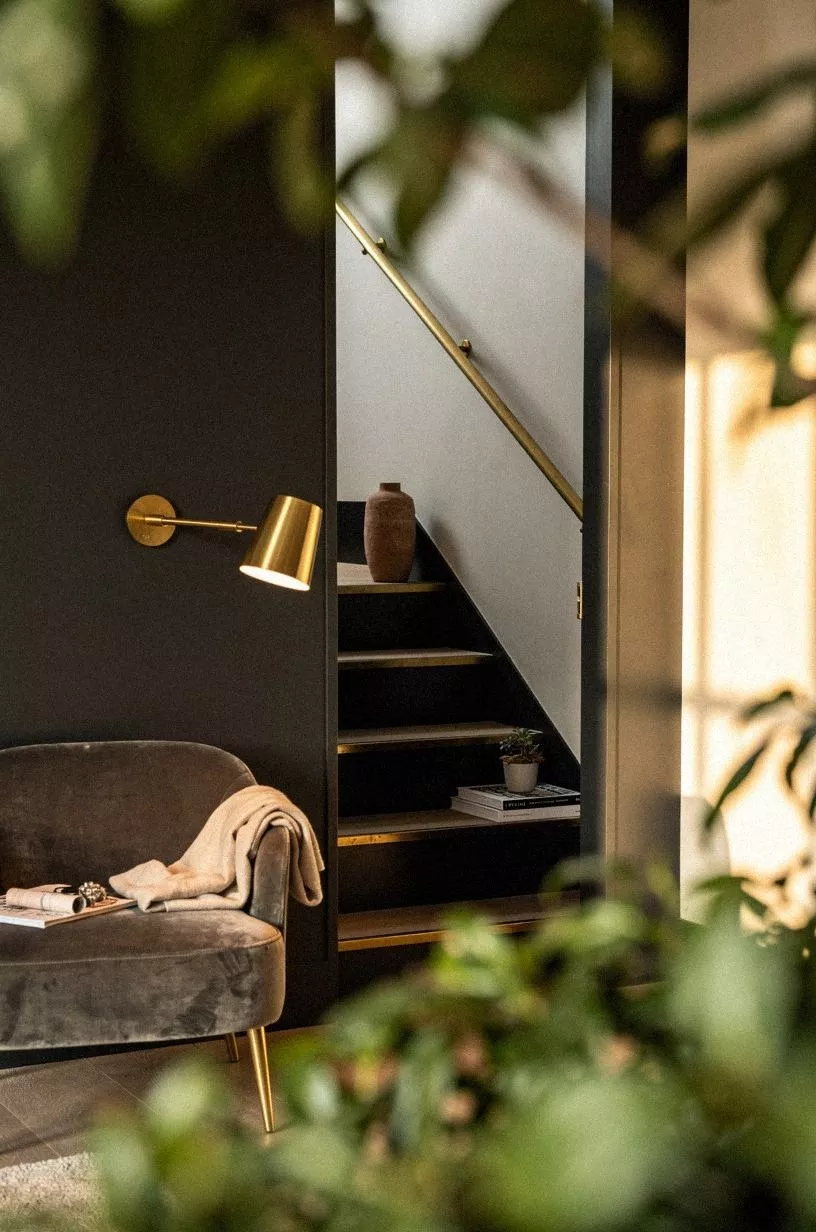 Paint the hidden staircase in charcoal lacquer
