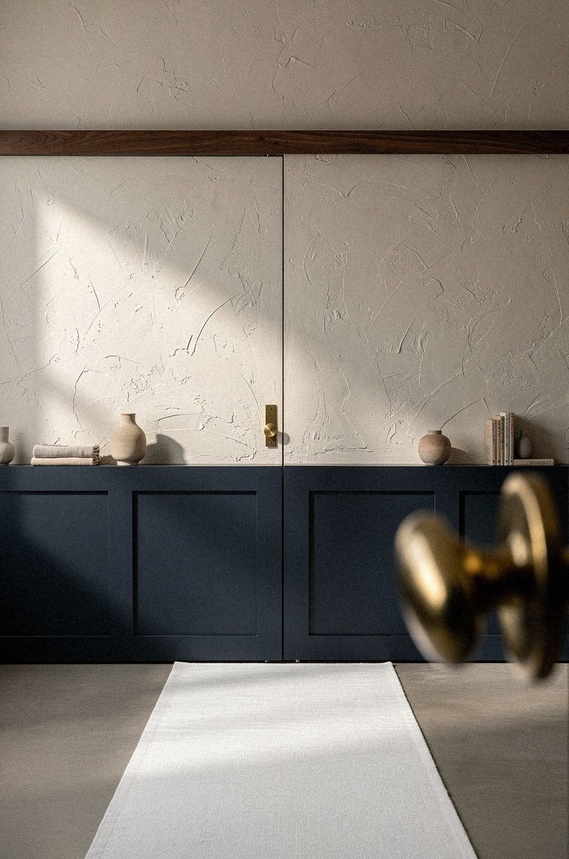 Slide a barn-style door along a hidden track