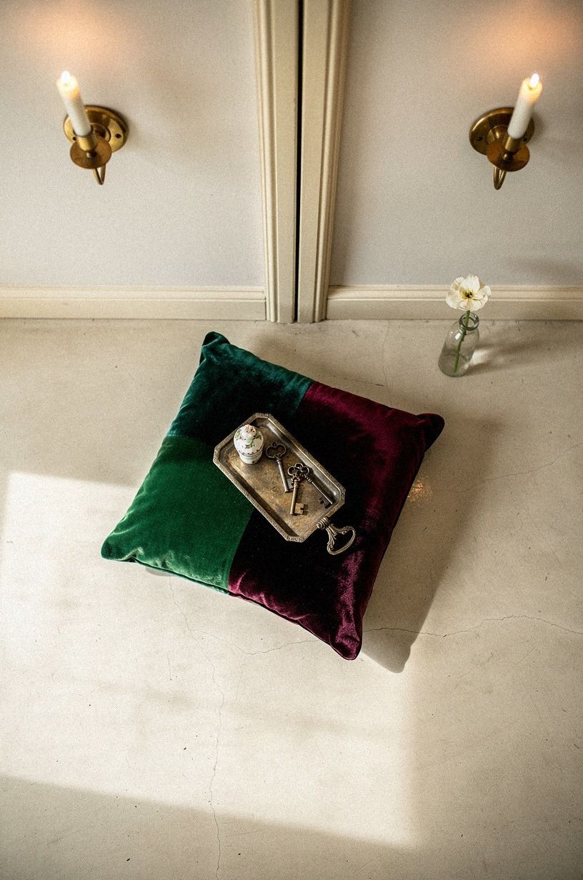 Light the threshold with candlelike sconces
