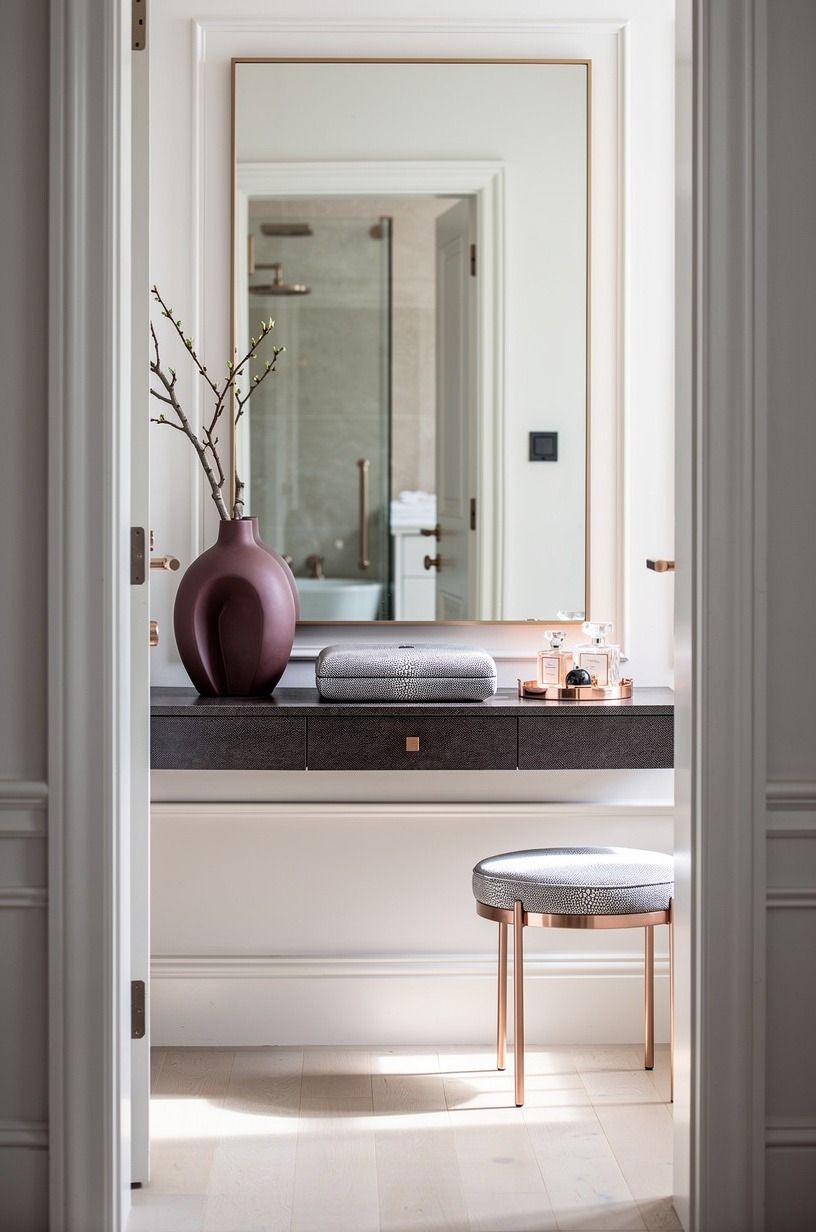 Float the vanity styling with fewer, larger objects