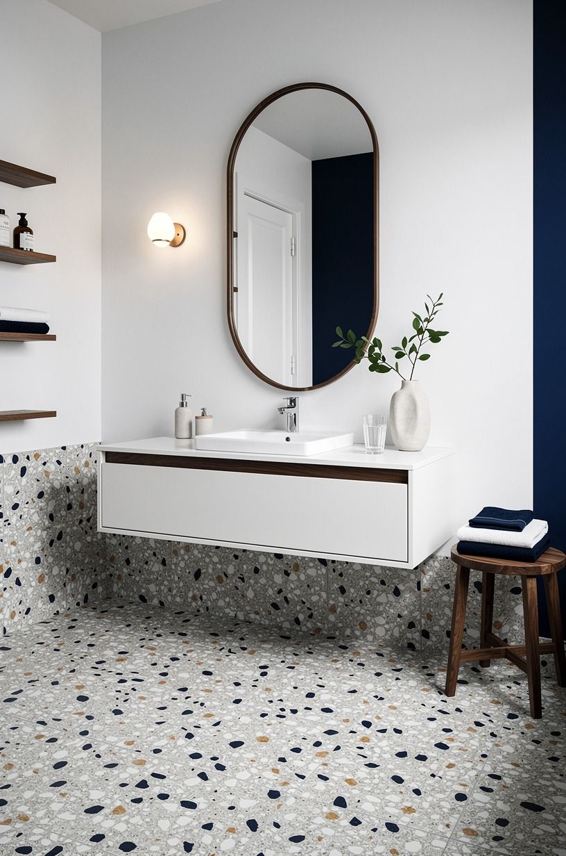 Frame the sink with an oval medicine cabinet