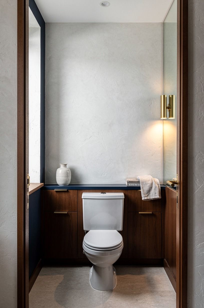 Frame the toilet with a narrow ledge