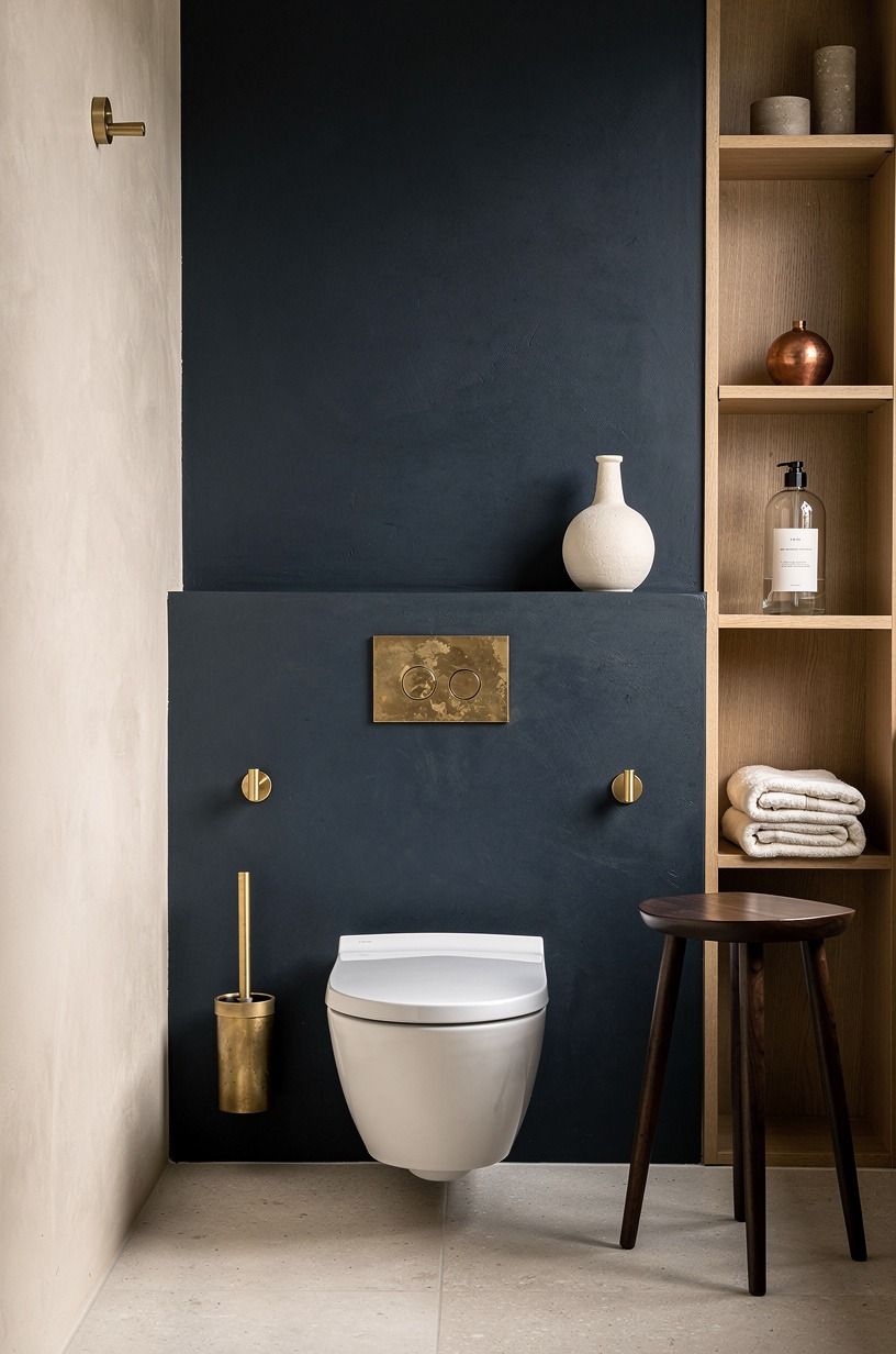 Give the toilet wall its own quiet job