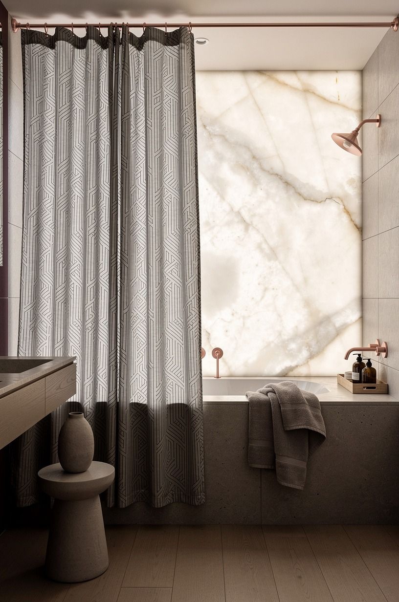 Hang a black-and-white shower curtain high