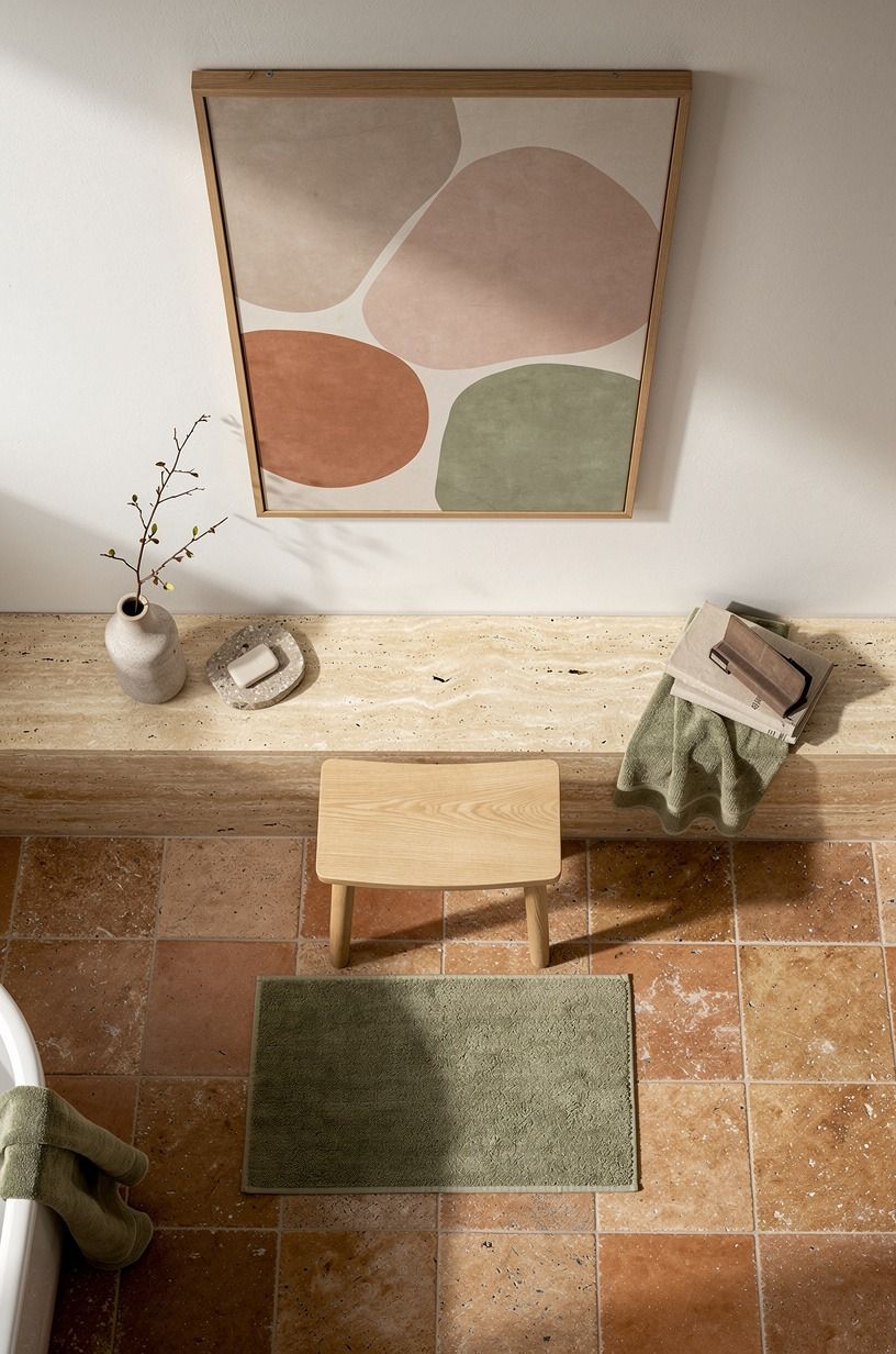 Hang Art That Softens the Bathroom Color Theme
