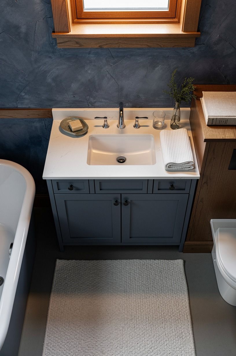 Paint the vanity in a dusky blue bathroom palette