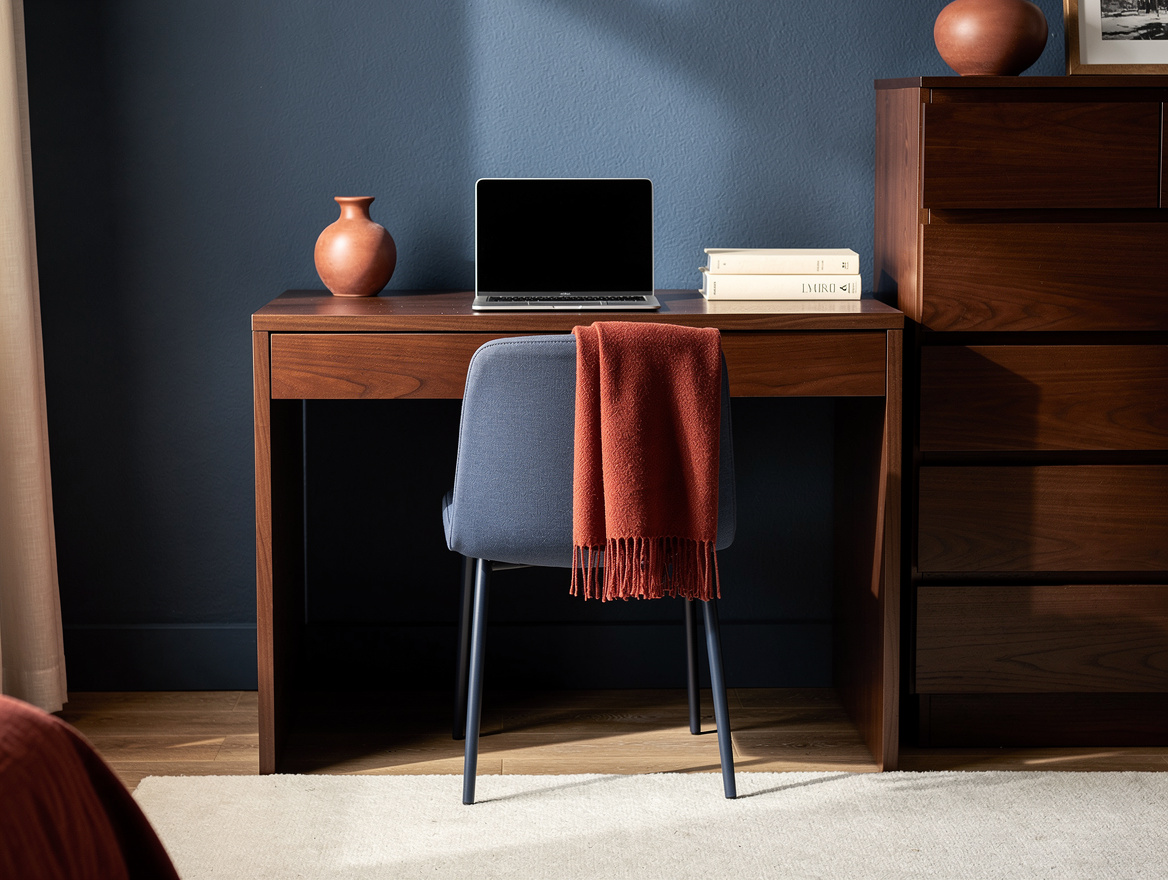 Medium-angle realistic photo of a 20-inch-deep desk with an armless chair tucked