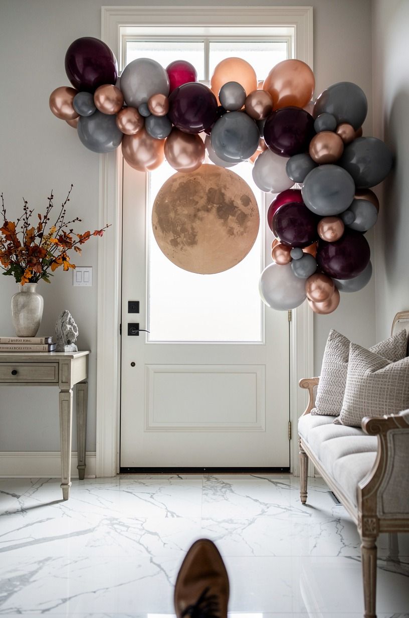 Paint a cardboard moon behind the balloons