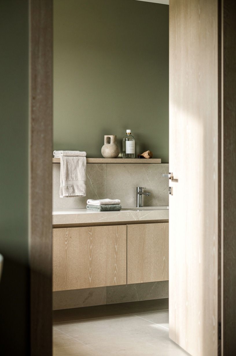 Float a slim shelf above the tile line