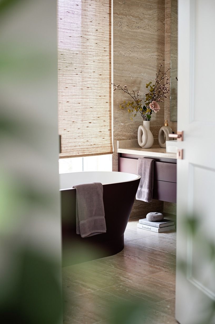 Hang a Woven Shade Beside the Tub