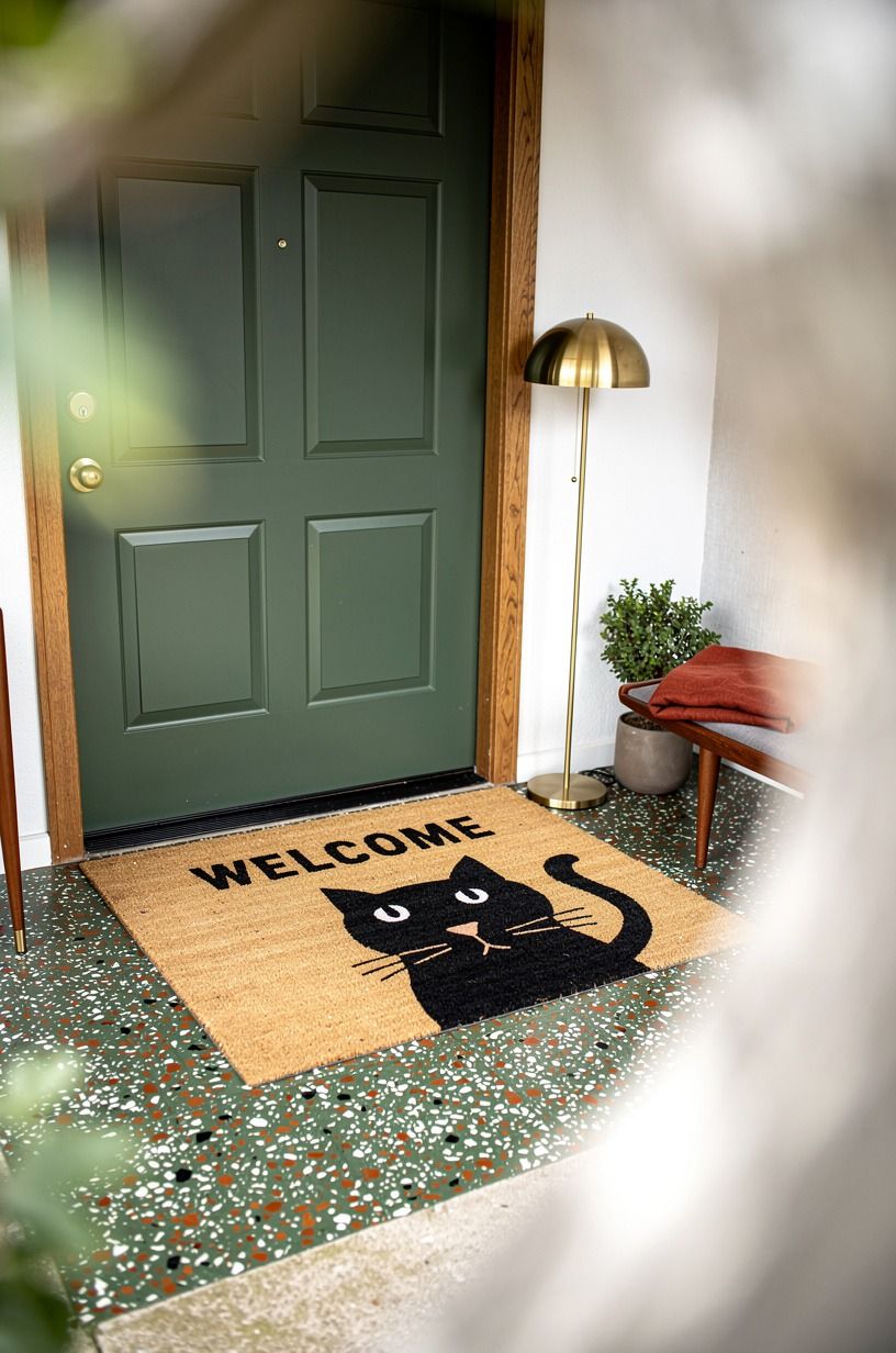 Swap Spiders for a Black Cat Welcome Mat