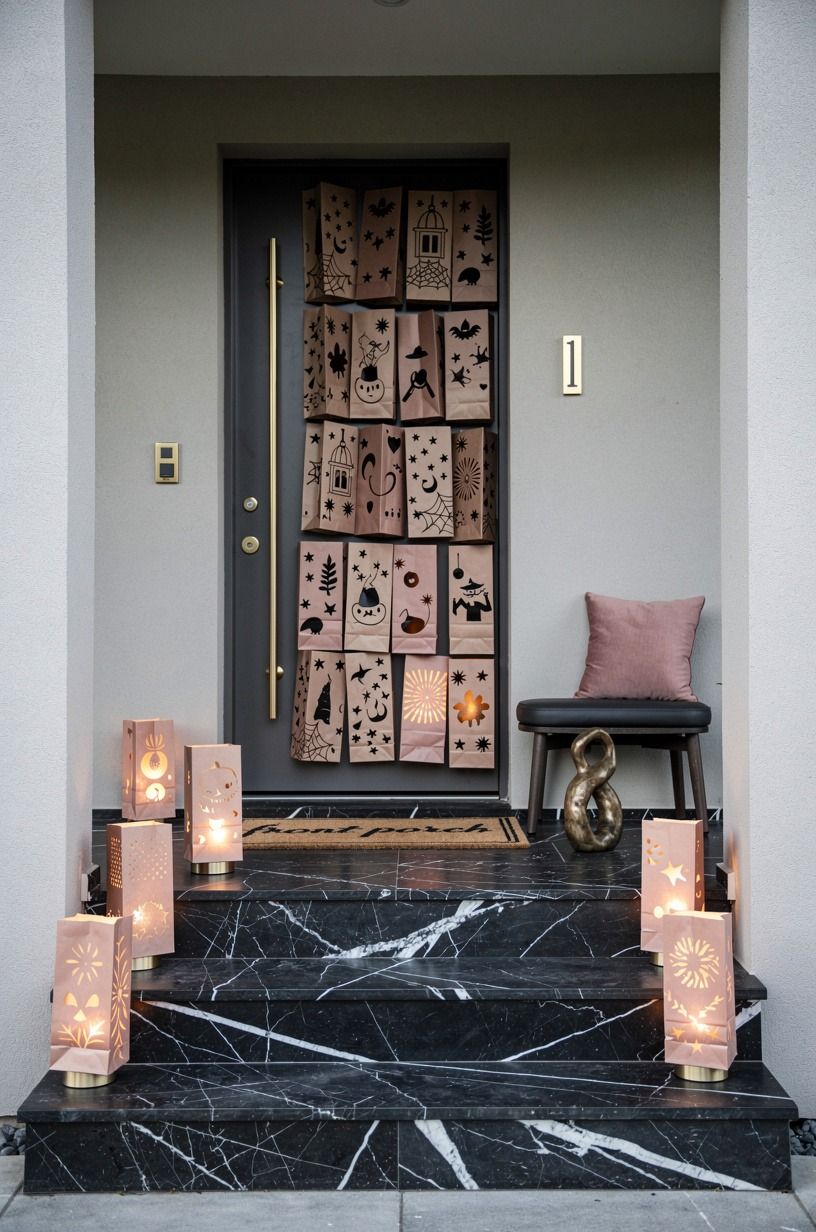 Cut Paper-Bag Lanterns for a Halloween Front Door Cover