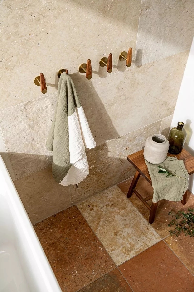 Replace the towel bar with sculptural hooks