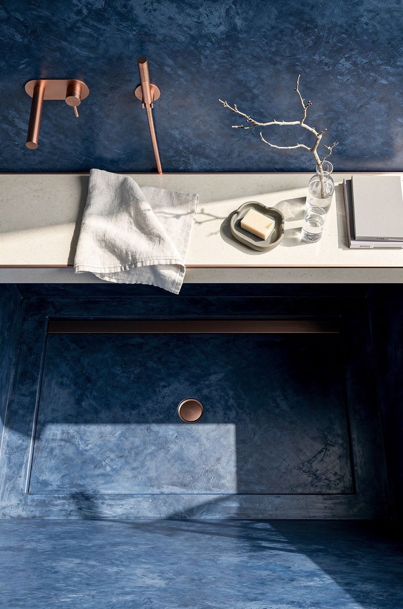 Float a slim ledge for an open-to-sky bathroom