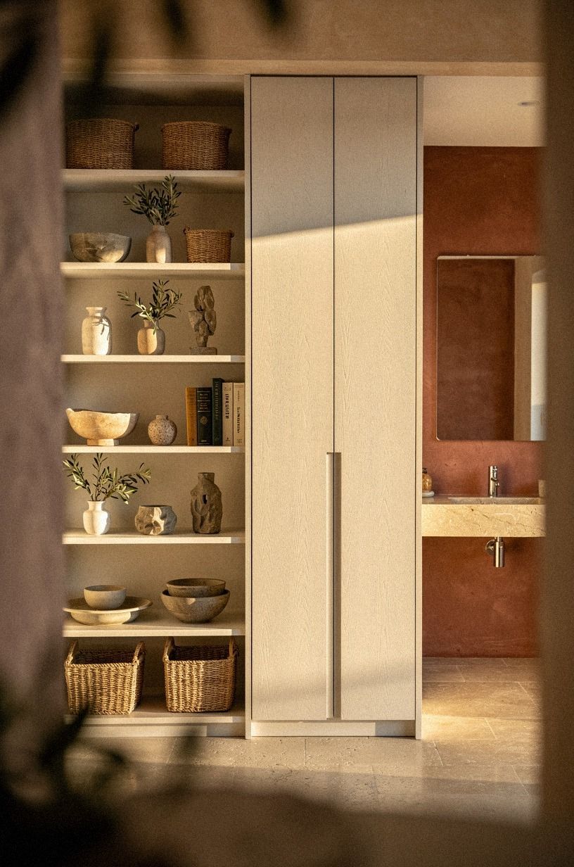 Contrast open shelves with concealed backups