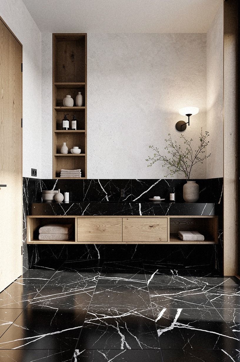 Layer black tiles in bathroom spaces with warm oak