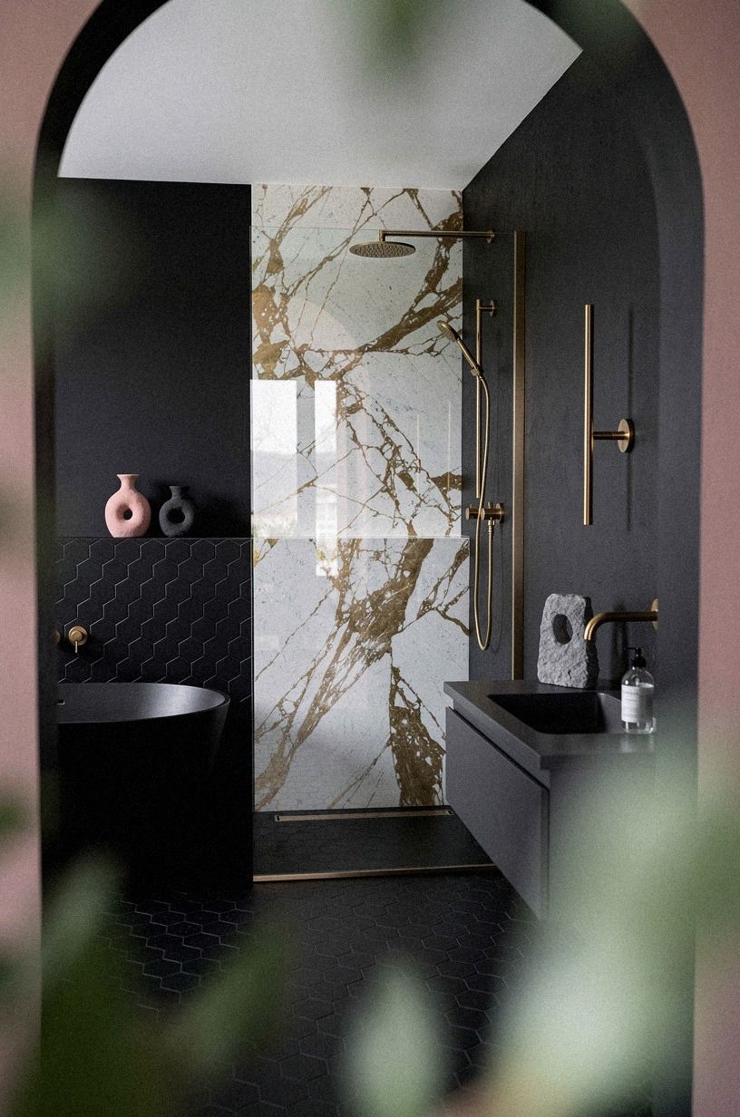 Pick black hexagon tile over a full black bathroom
